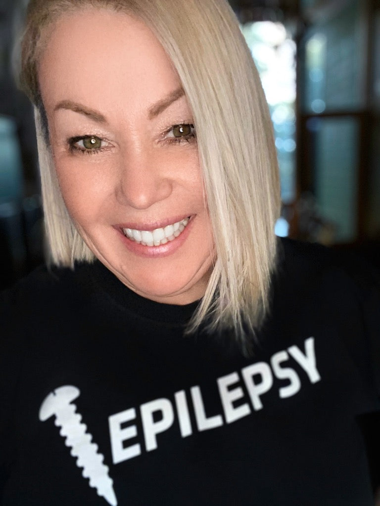 Jann Arden wearing our Screw Epilepsy Unisex Shirt