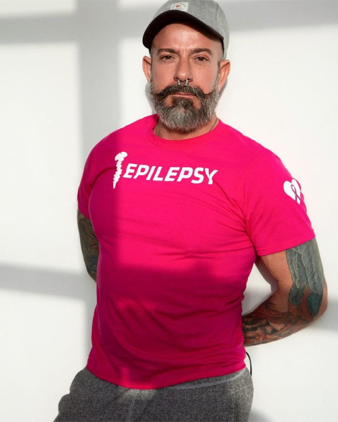 Alkan Emin wearing our Screw Epilepsy Unisex Shirt