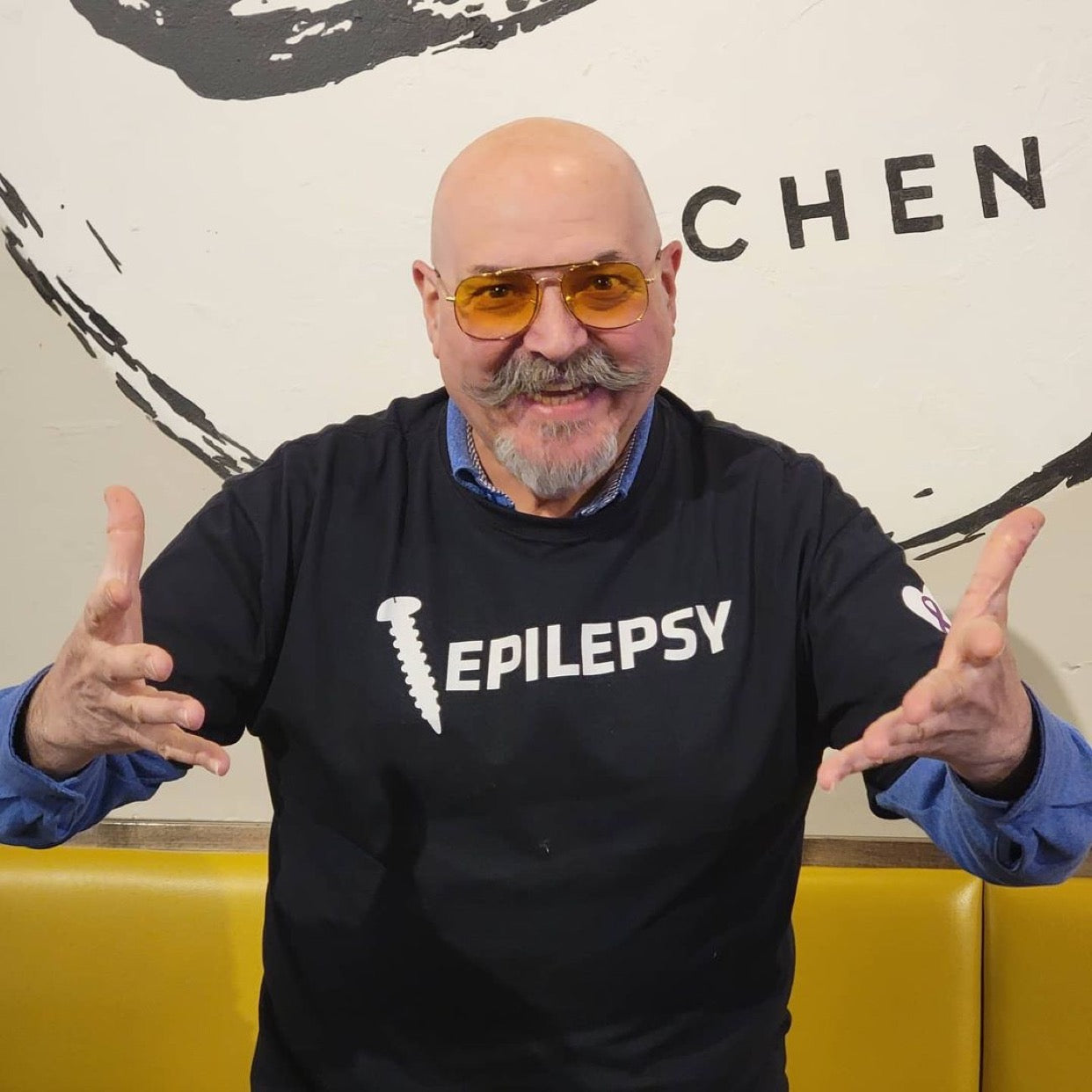 Massimo Capra wearing our Screw Epilepsy Unisex Shirt